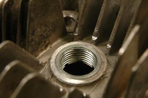 Byt tändstiftsgängan