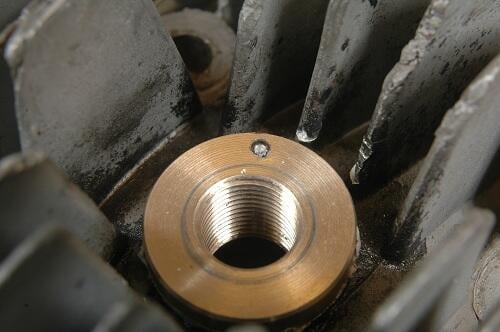 Byt tändstiftsgängan